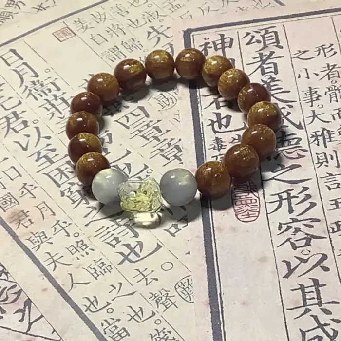 Self-Crossing · Golden Nanmu & Clear Quartz Awakening Lion Bracelet" - Image 3